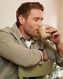 Portrait Handsome Blond Man Cafe Sits Chair Enjoys Taste Delicious Freshly Brewed 2 Copy